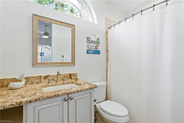 The cabana bathroom offers a shower/tub combo with natural light
