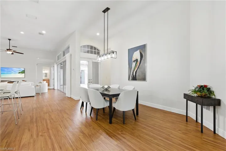 The formal dining space is located just off the main entrance and powder bath