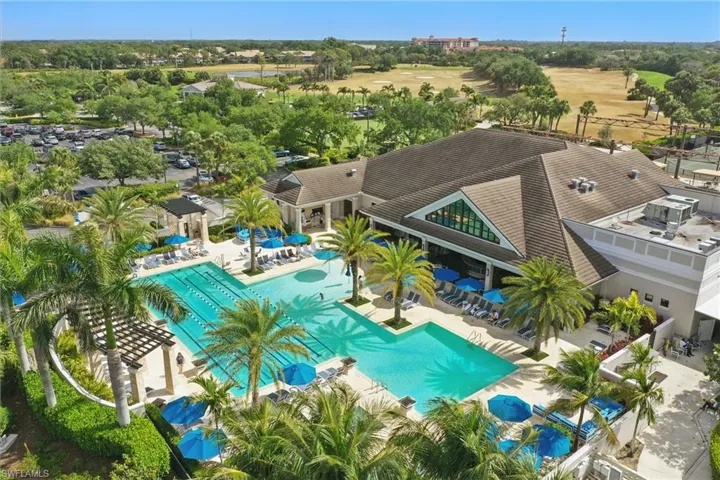 The clubhouse pool features lap pool and plenty of options for dining and lounging by the pool