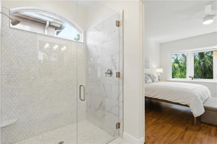 The large and contemporary shower allows easy walk in access and glass doors for plenty of natural light