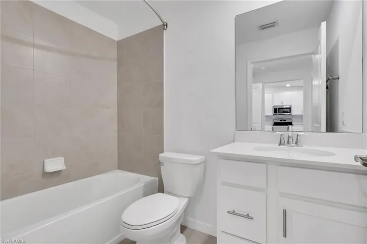 2nd Bathroom located in hall next to 2nd bedroom