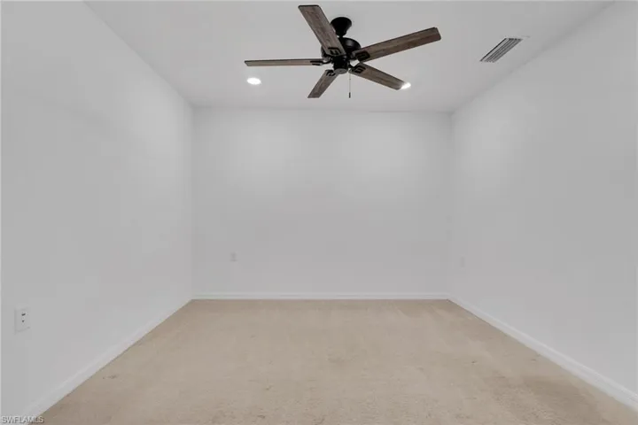 Den located off living room
