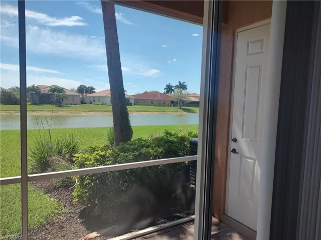 Water view featuring nearby suburban area