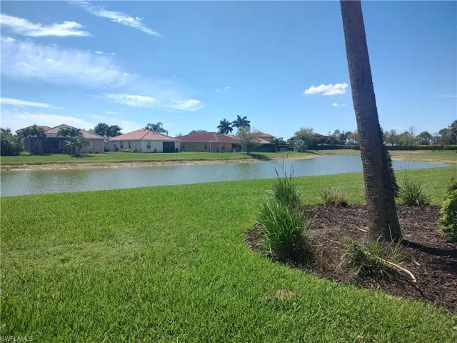 Water view with nearby suburban area