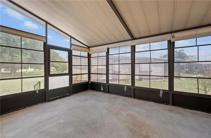 Unfurnished sunroom with a healthy amount of sunlight