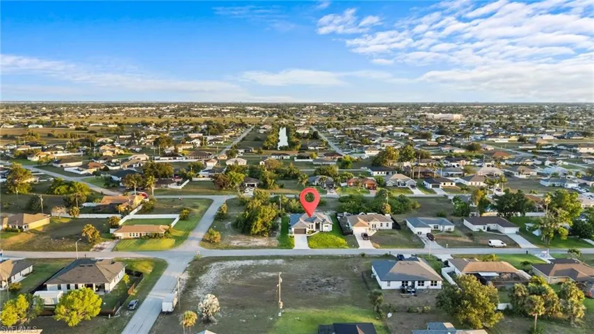 View of property location featuring nearby suburban area