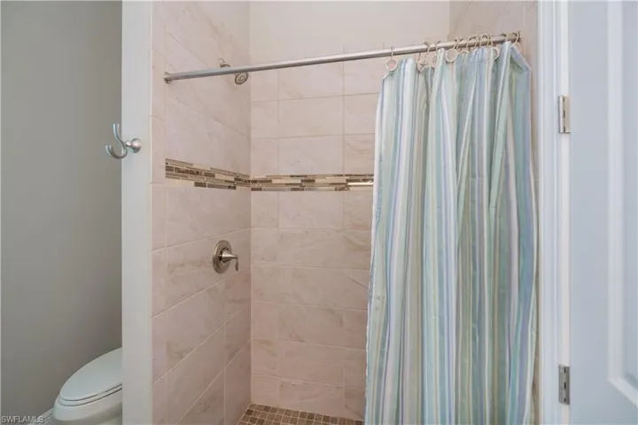 Full bathroom featuring gorgeous tile-work in your walk in shower