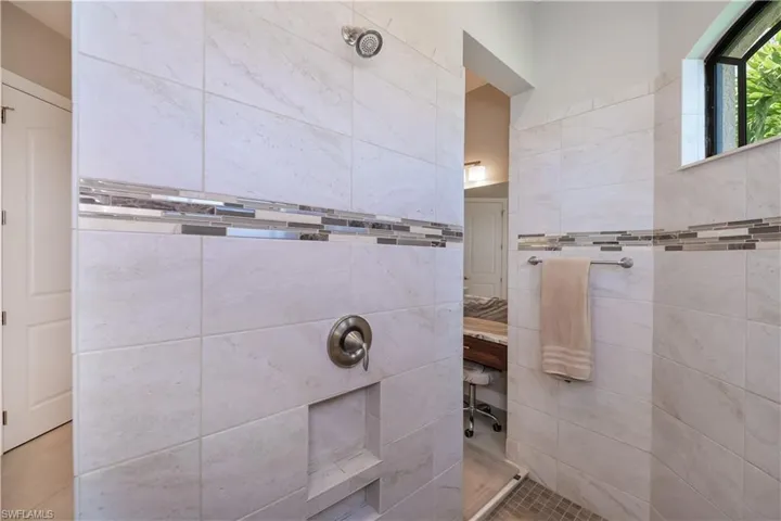 Gorgeous tile in your immense walk in shower