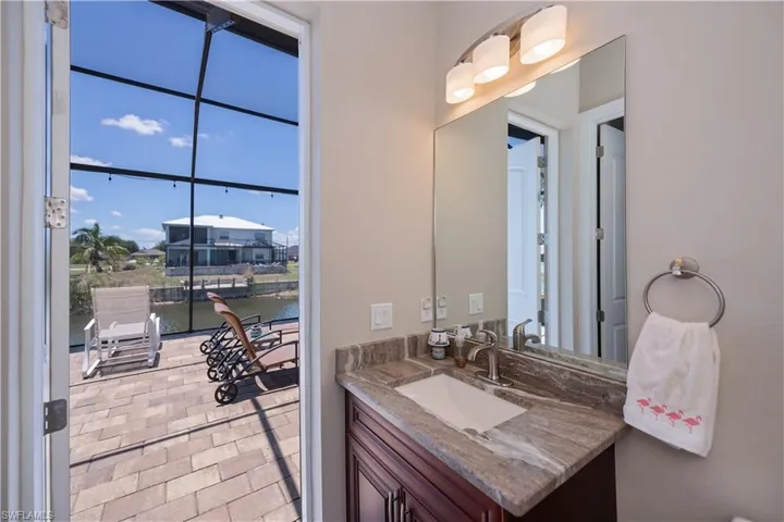 Guest bathroom leads to pool area-no wet feet traipsing through the house!