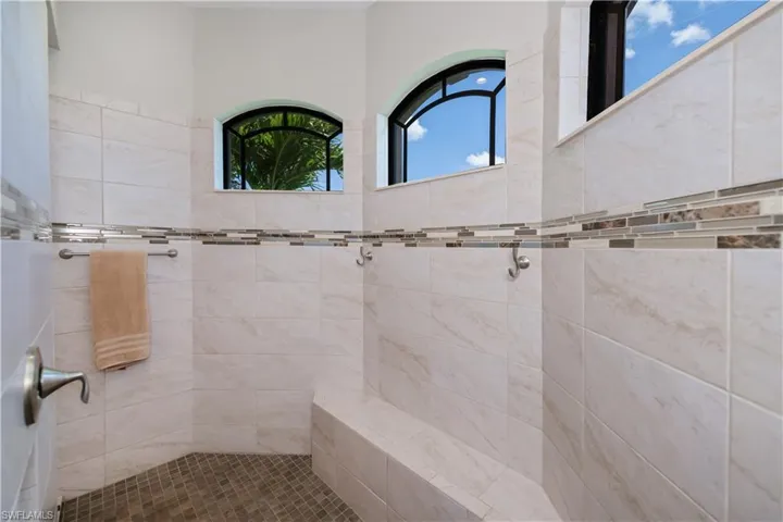 Elevated windows allow natural light in and a built in bench for comfort