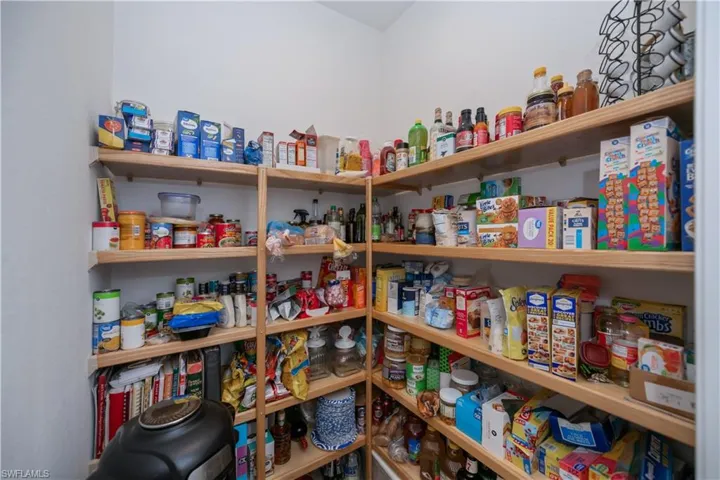 Huge pantry with upgraded wood shelving