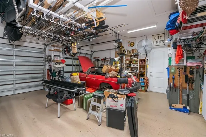 3 car garage with composite flooring and tons of storage