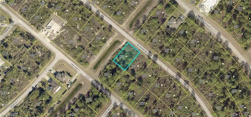 Aerial overview of property's location with property parcel outlined