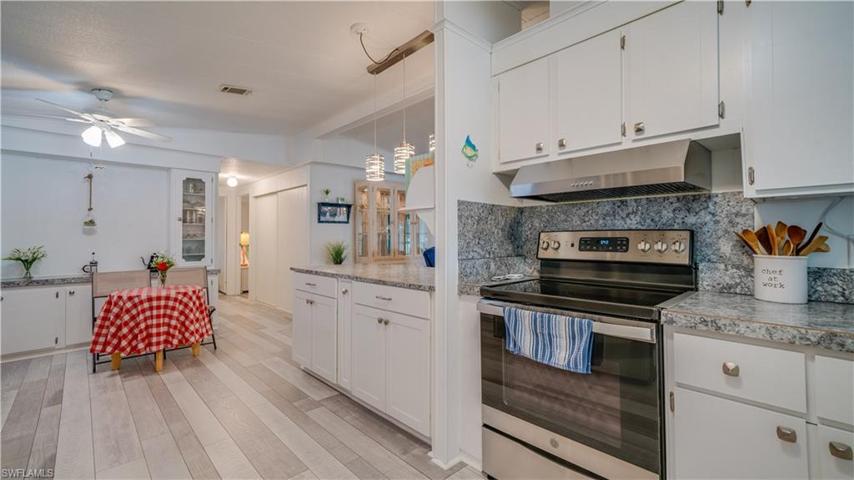 The open great room concept is perfect for entertaining. The kitchen offers much, much cabinetry with pull-out drawers for your pots and pans, pantry items, and spices.