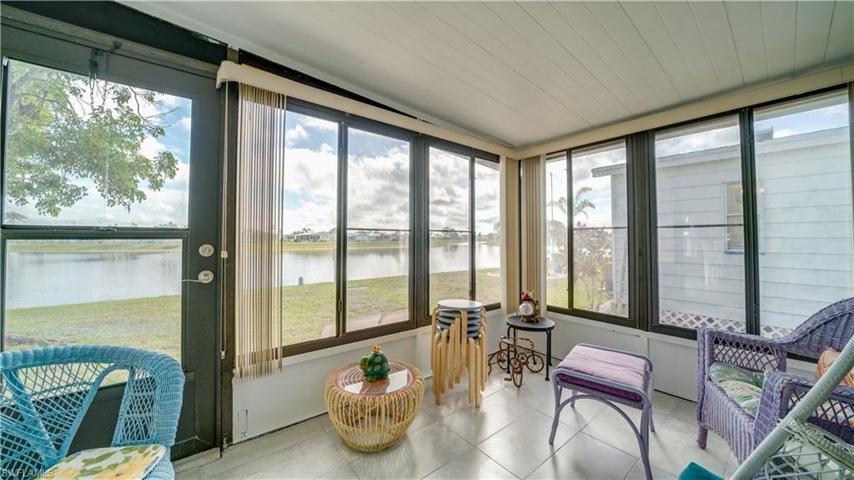The newly installed ceramic floor glistens in this space. The sliding windows, with screens of course, are yours to enjoy.