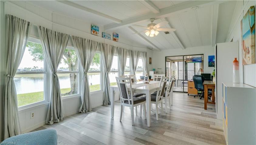 Wow! A room with a view! Bright, cheerful and lakefront. The possibilities are endless in this expansive fully under air room. Notice those windows!