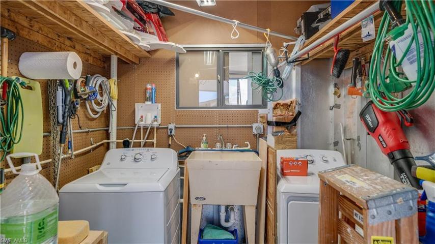 Just steps from the kitchen, the new owners will enjoy a new washer and dryer. A laundry tub ~ a must. Plus there still room for storage.