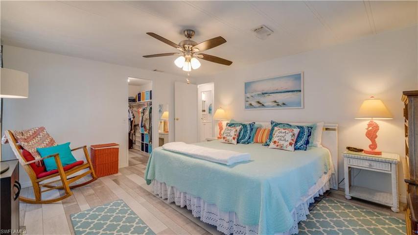 The master bedroom hosts a king size bed, a sitting area, dressers, etc., etc., etc.! The master closet - just steps away.