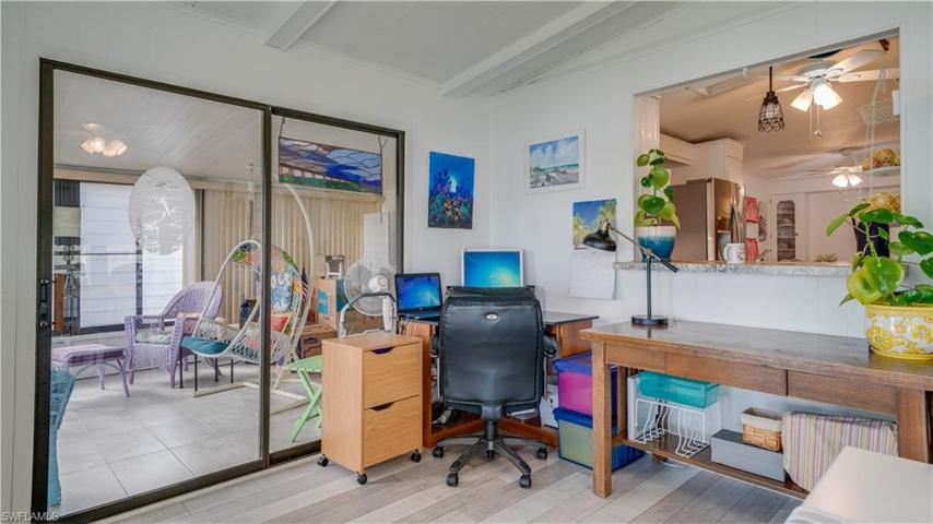 Use this bonus room as you'd like. Want an inside laundry. It's an easy transition from shed to the bonus room. You'll have the convenience of retractable screens on this bonus/lanai area.