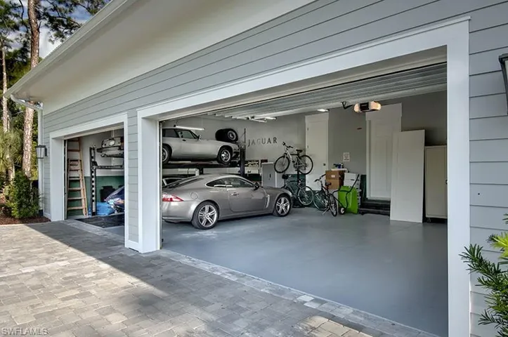 Garage featuring a garage door opener