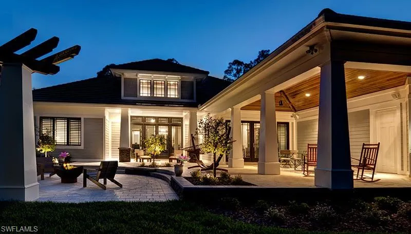 Rear view of property featuring a patio
