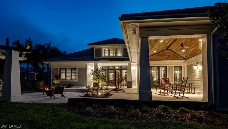 Rear view of house featuring french doors and a patio