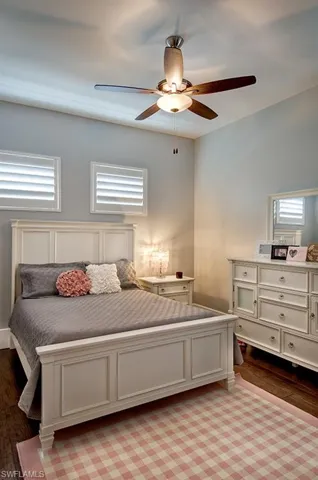 Bedroom with light wood-type flooring and ceiling fan