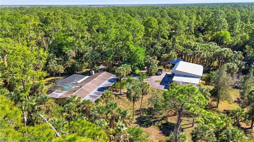 Drone / aerial view of a heavily wooded area
