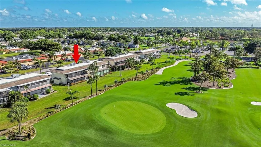 Aerial perspective of suburban area with a golf club