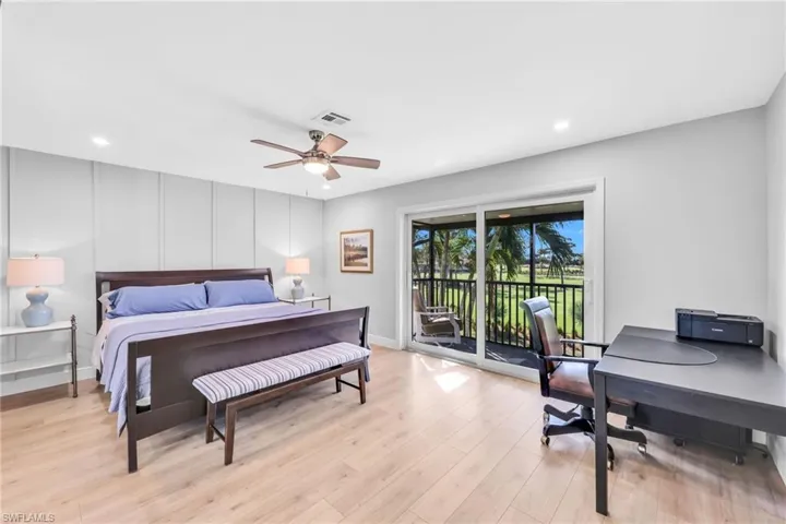 Bedroom featuring an office area, light wood-style flooring, access to exterior, recessed lighting, and ceiling fan