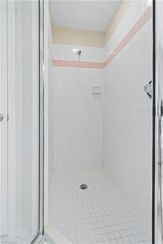 Bathroom with a tile shower