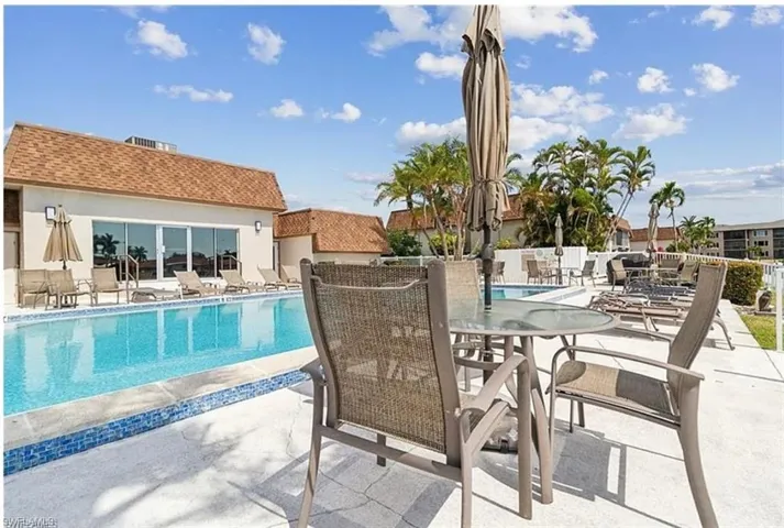 View of pool with a patio area