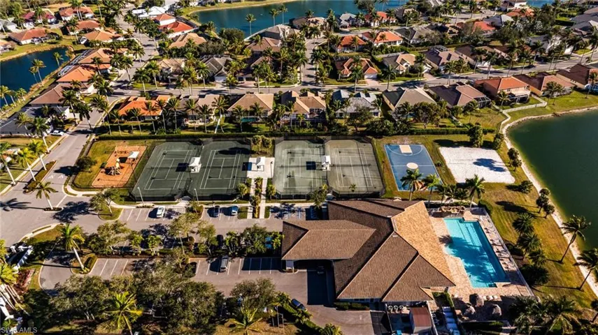 View of property location with a large body of water and nearby suburban area