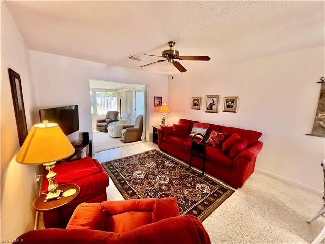 Living room with terrazzo floors.
