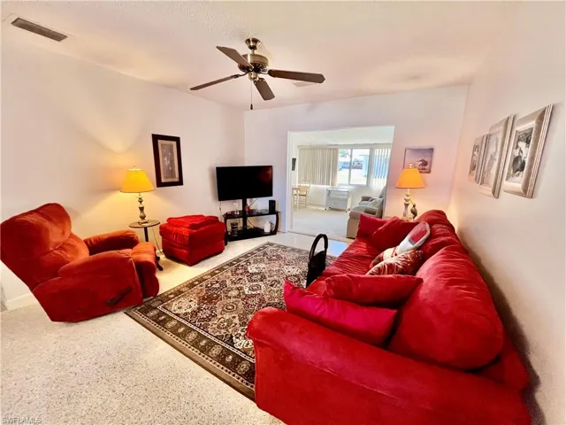Living room with terrazzo floors.