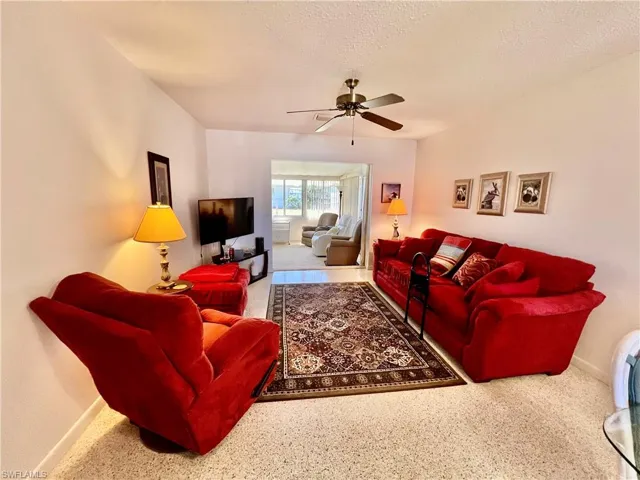 Living room with terrazzo floors.