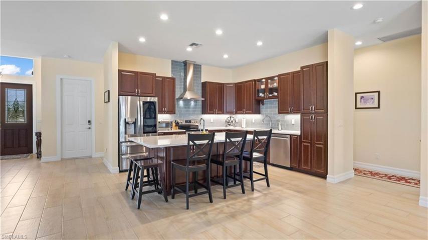 All upgraded stainless steel appliances including below counter microwave.  Beautiful subway tile backsplash and multiple sinks with upgraded faucets!