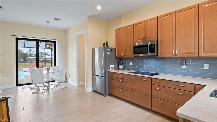 So much space it really allows a full time multi generational setup where everyone has a beautiful space and their own privacy.  Door leads to hallway into main residence.