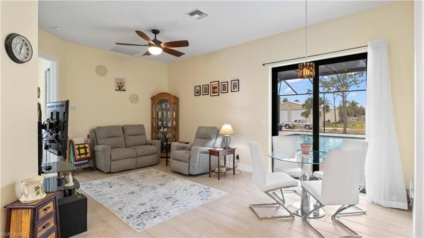 Guest home living area - lots of flexible space, tall ceilings and sliders to the outside.