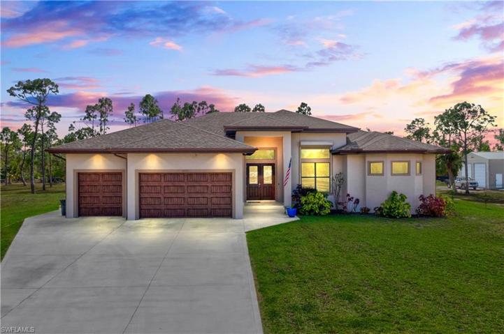 Welcome home to this STUNNING country estate on two and a half acres in the heart of the BOOMING Northwest Corridor!