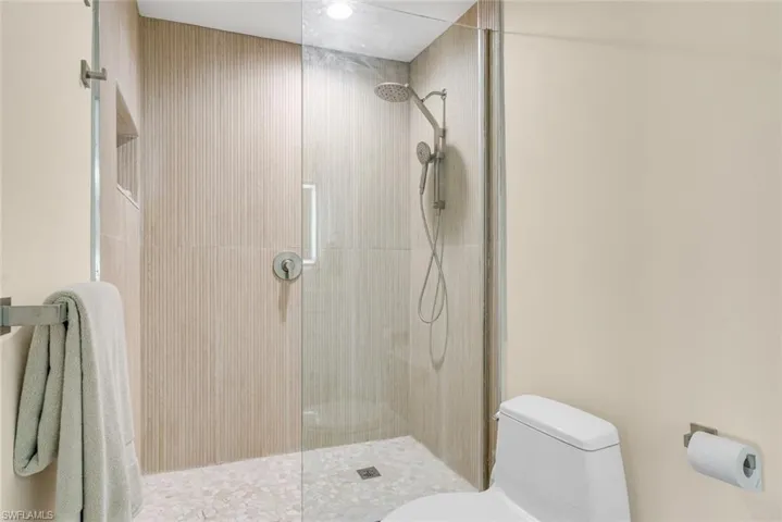 Full bathroom featuring walk in shower