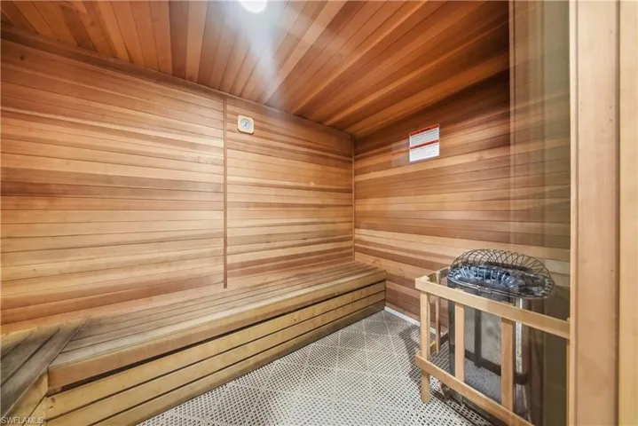 Relaxing sauna with wooden ceiling and wood walls