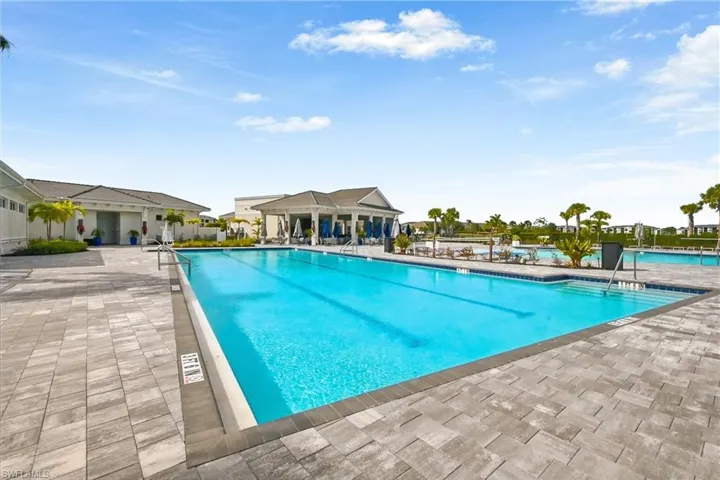 Community pool featuring a patio area