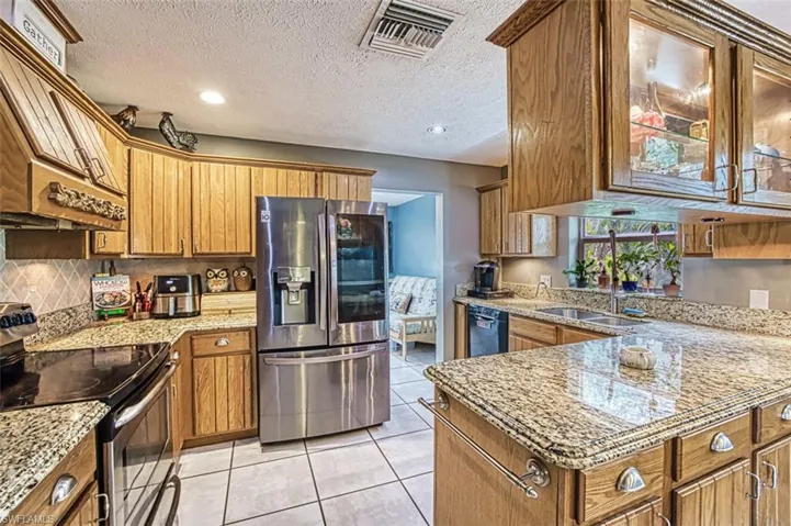 6100  Cypress Hollow  WAY, Naples, FL 34109