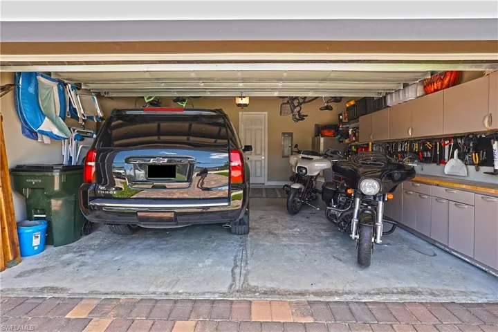 2 car garage fits large SUV +storage and work area
