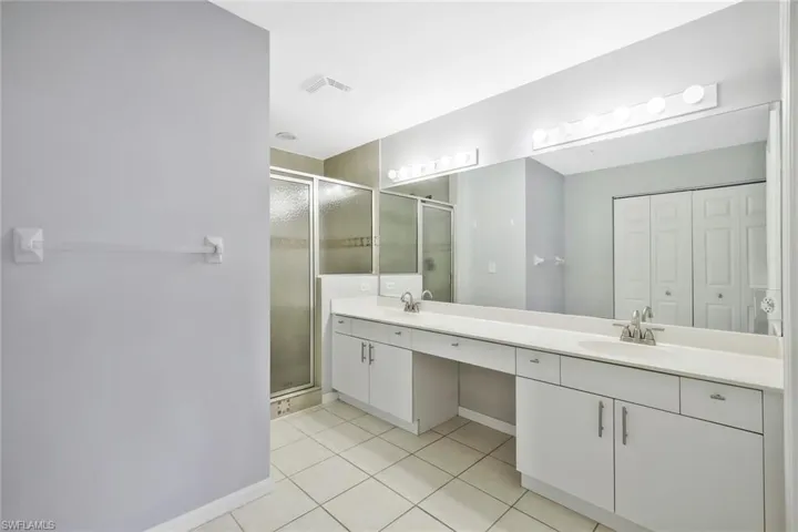 Master bathroom with dual sinks.