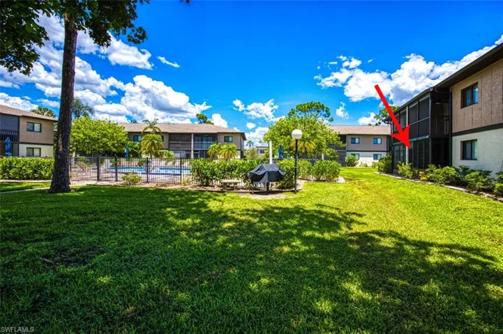 View of yard featuring a fenced in pool