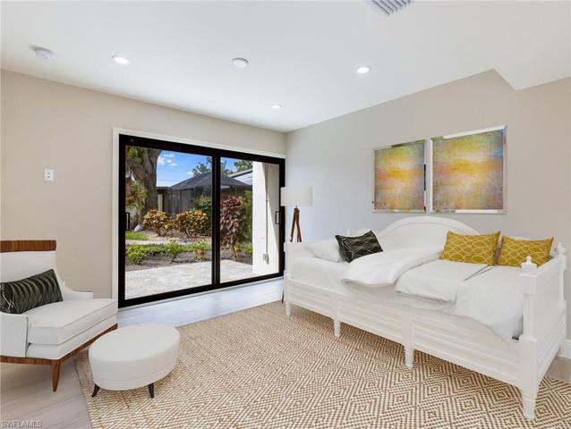Front guest bedroom or den with pavered patio access