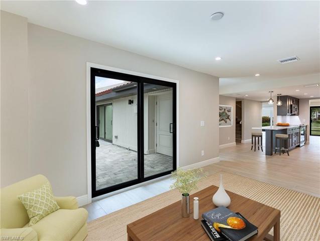 Family room to entry patio and kitchen