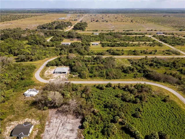 Birds eye view of property featuring a rural view
